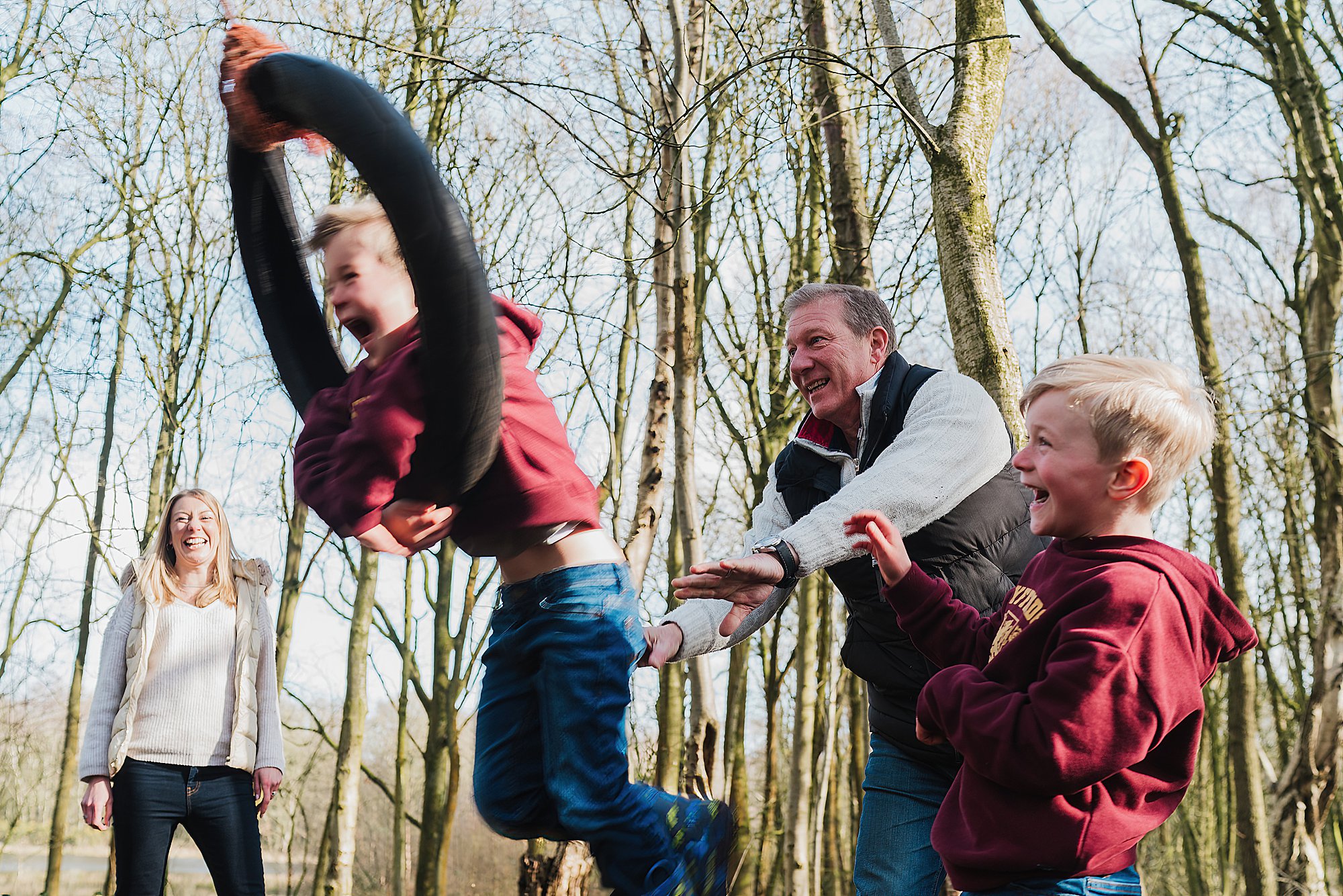 Family playing on tyre swing at Brown Moss Nature Reserve, Shropshire // Shropshire Family Photographer