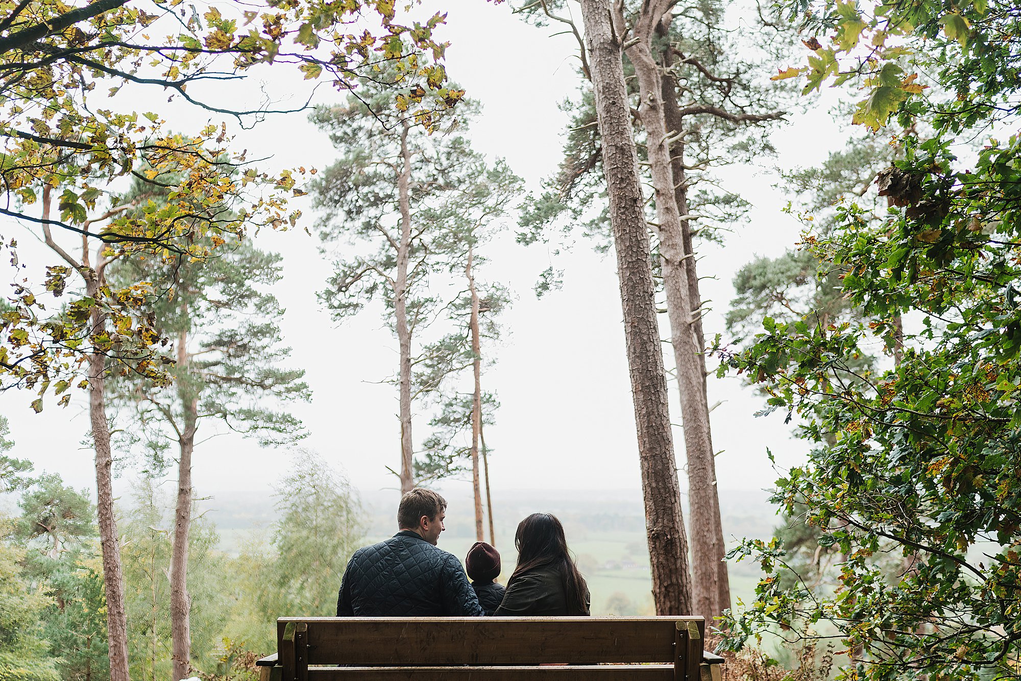 Family sat on the bench at Grinshill Nature Reserve looking at the view // Charlotte Giddings Photography