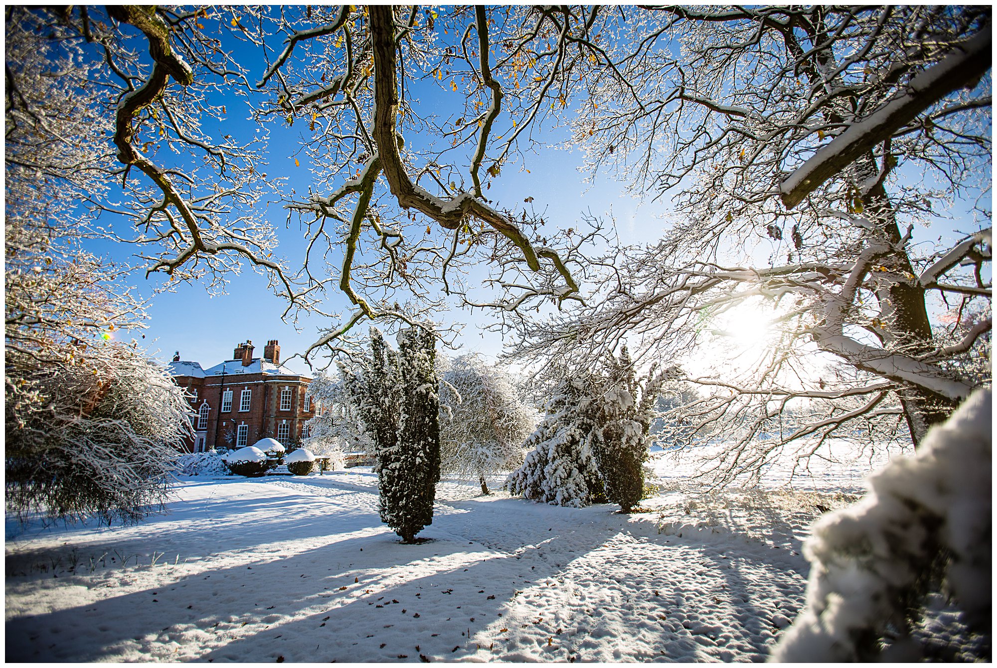 looking out at iscoyd park wedding venue in the snow - Shropshire Wedding Venues in the Snow