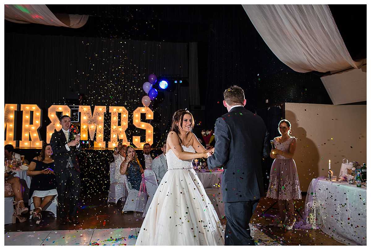 another confetti canon going off as another surprise during the first dance