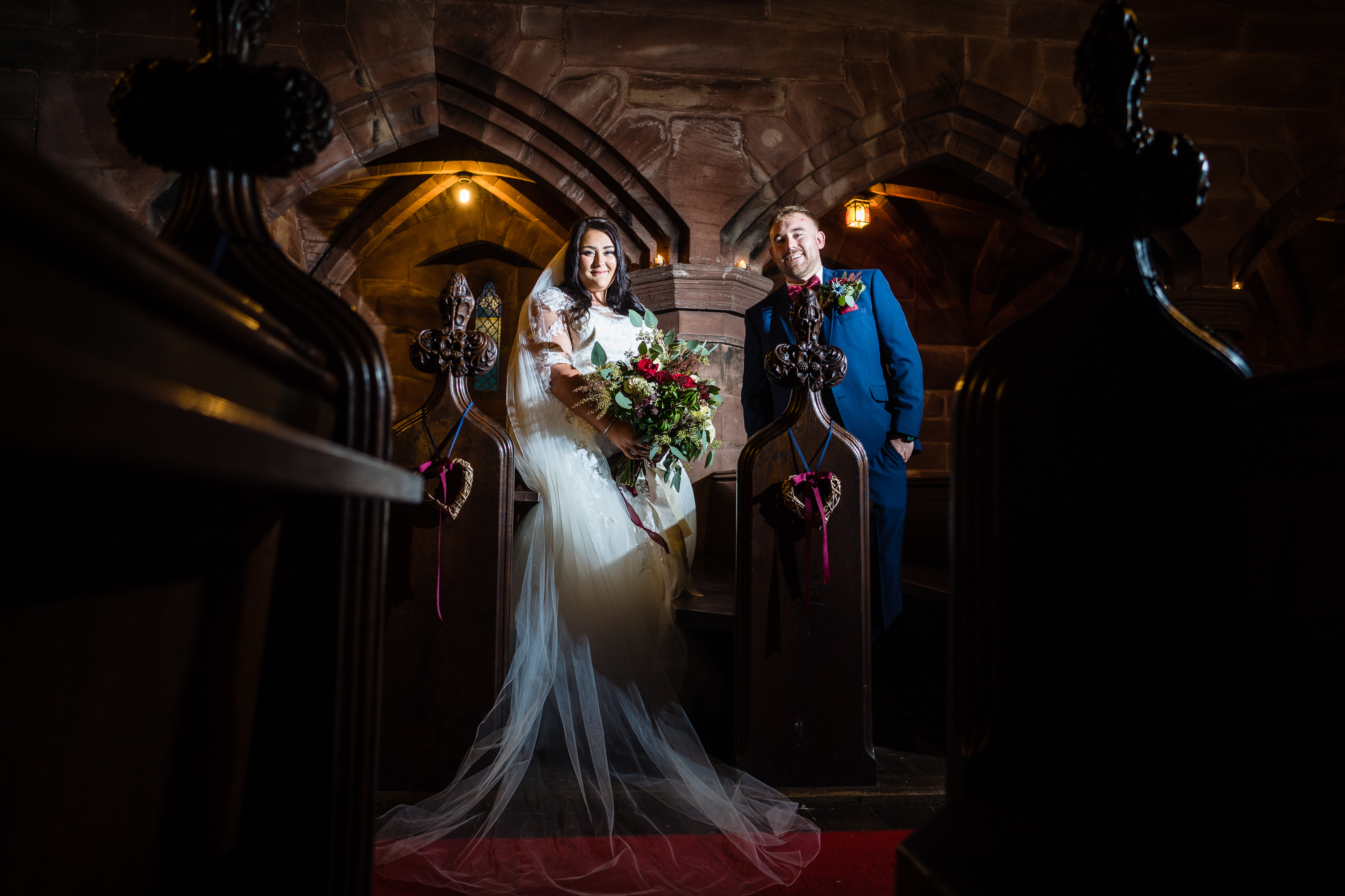Peckforton Castle Winter Wedding Peckforton Castle Christmas Wedding, bride and groom in chapel at Cheshire Venue