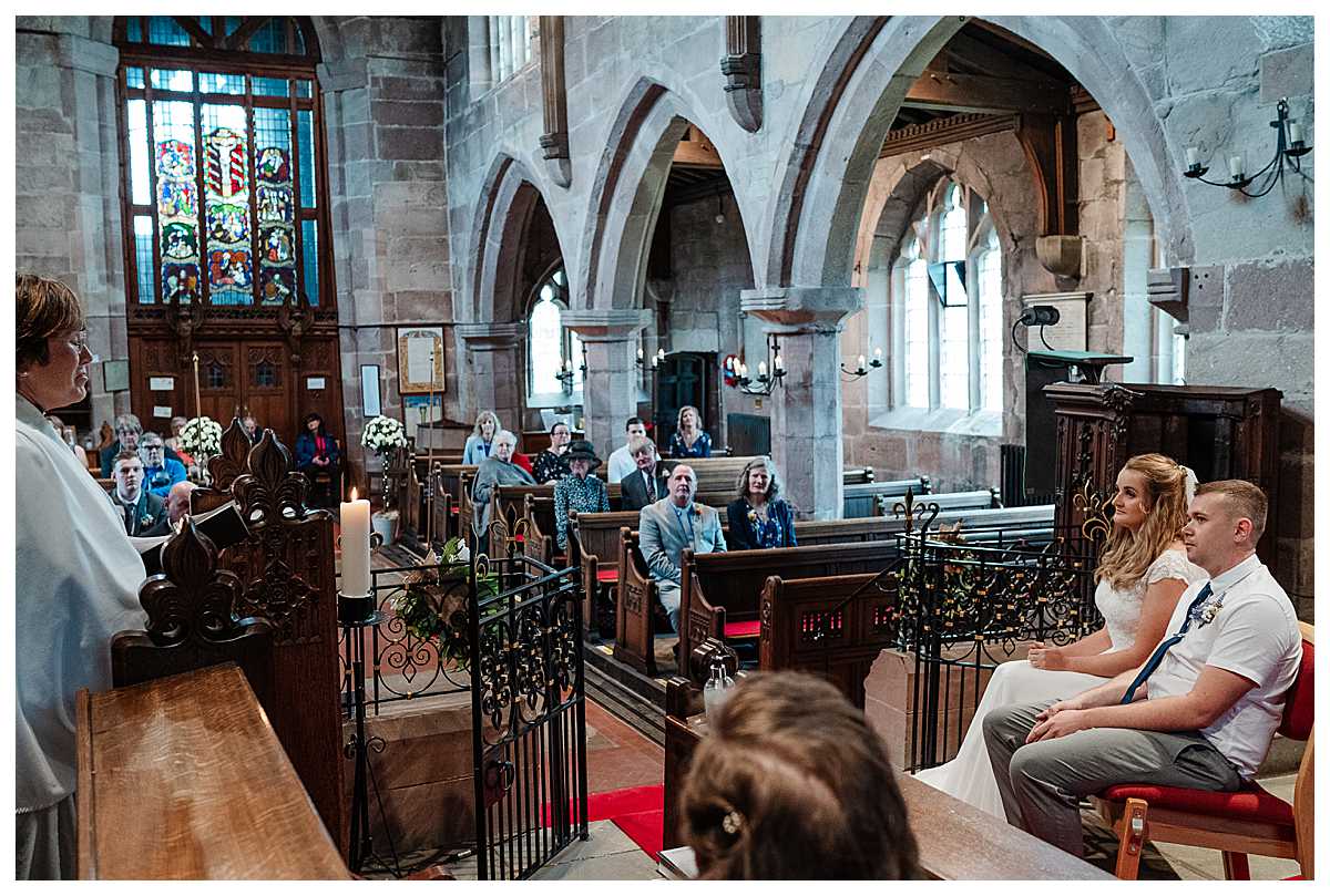 reverend talking to congregation at marbury church, shropshire - shropshire wedding photography