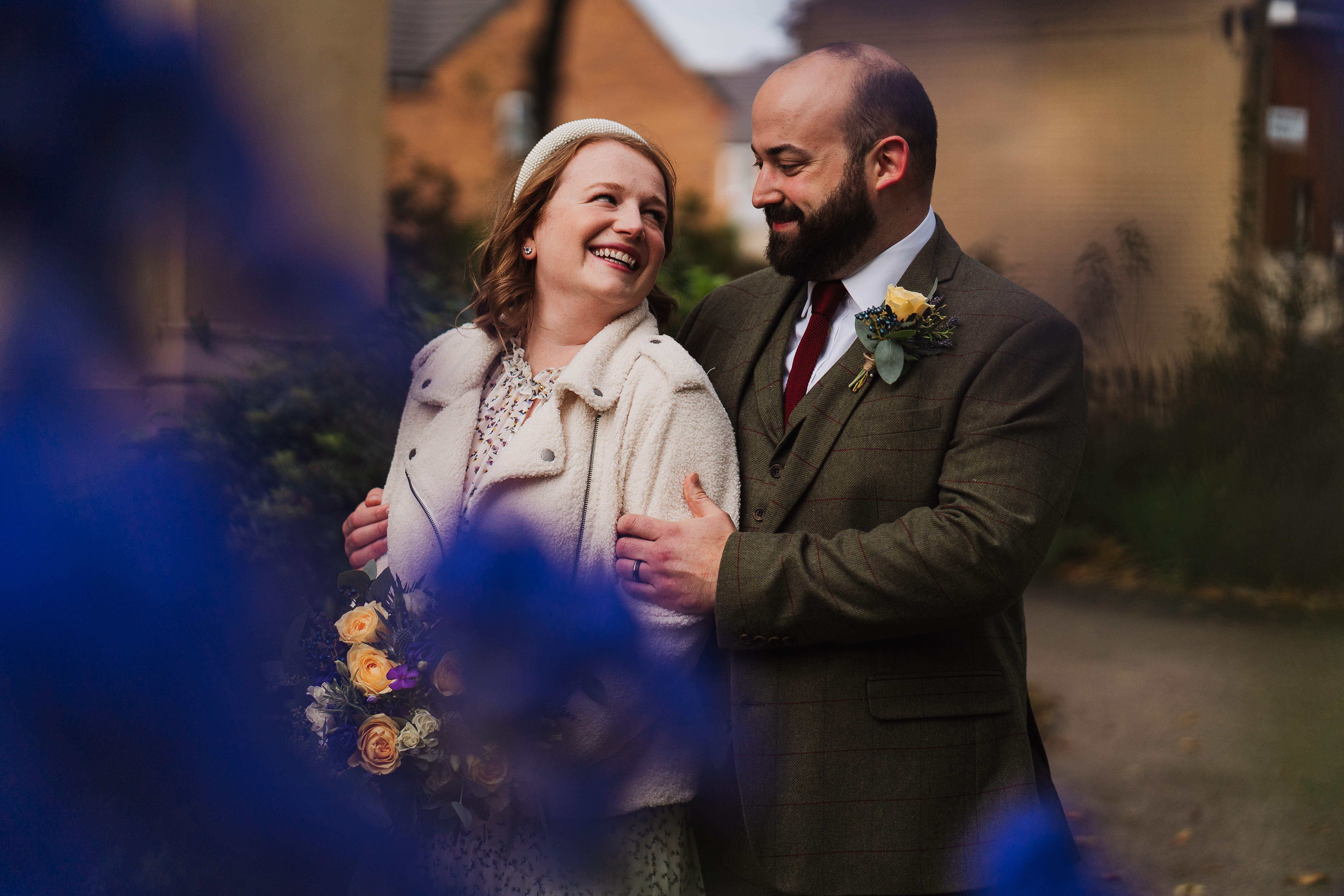 couple looking incredibly happy outside elizabeth gaskells house, manchester - charlotte giddings photography