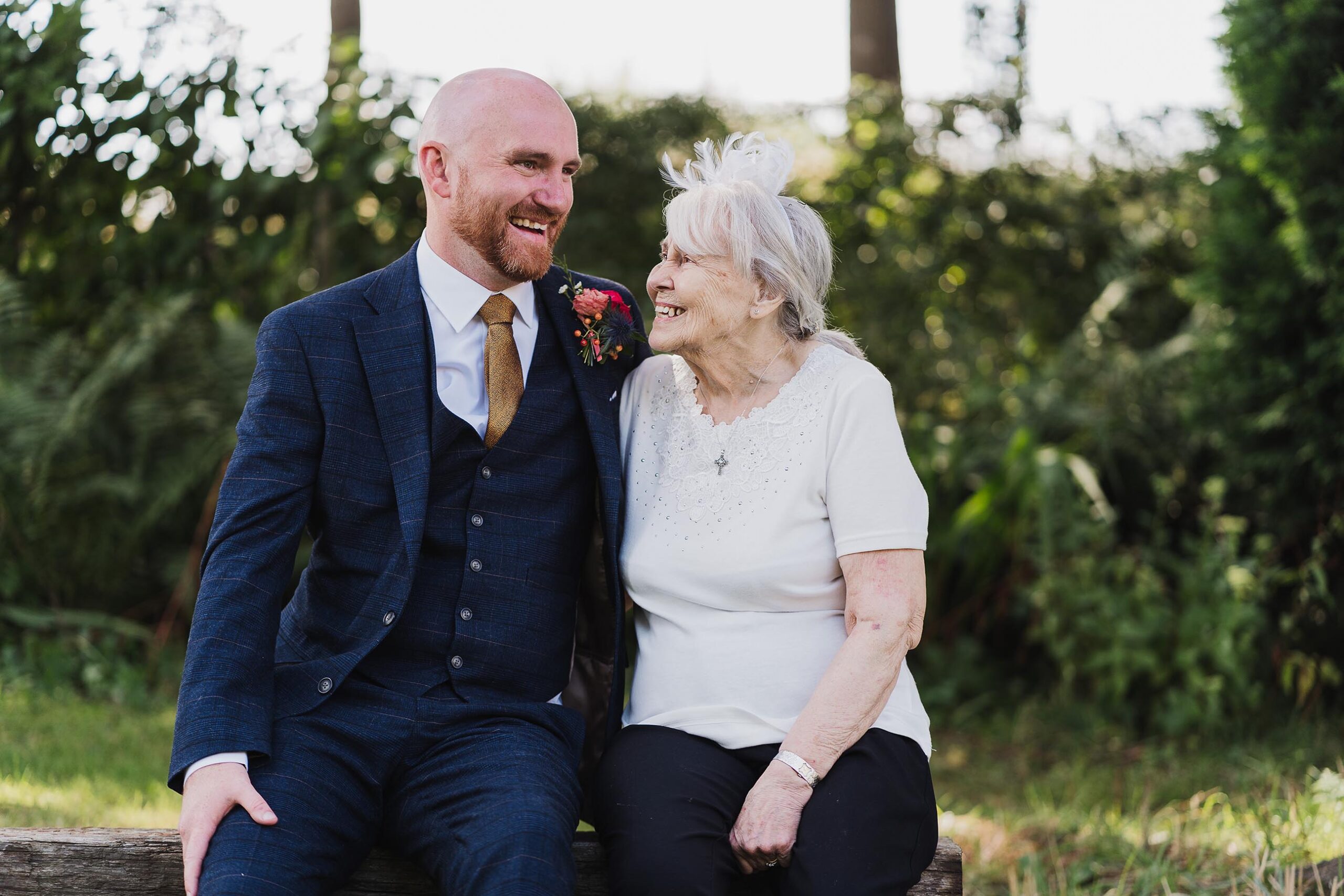 nan looking at grandson adoringly and with lots of pride, cheshire wedding photographer