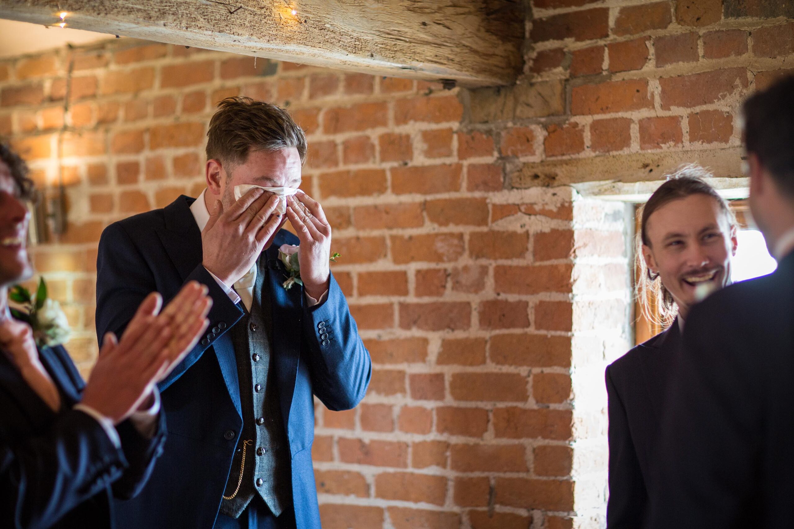 Groom wiping away his tears at Soulton Hall Spring Wedding, Charlotte Giddings Photography