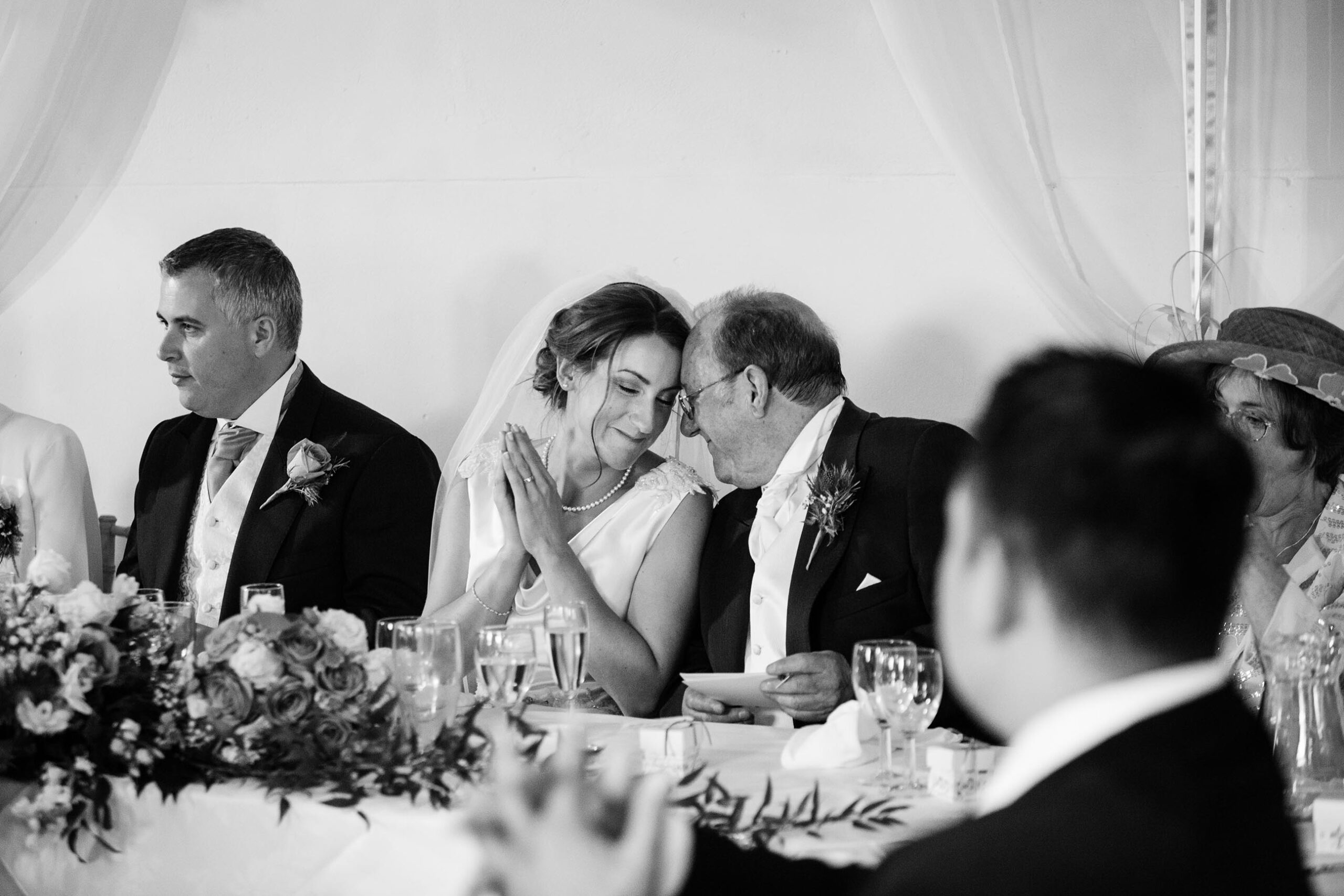 father daughter touching forehead, moment of appreciation of he just did his speech at Soulton Hall, Shropshire Wedding Photographer