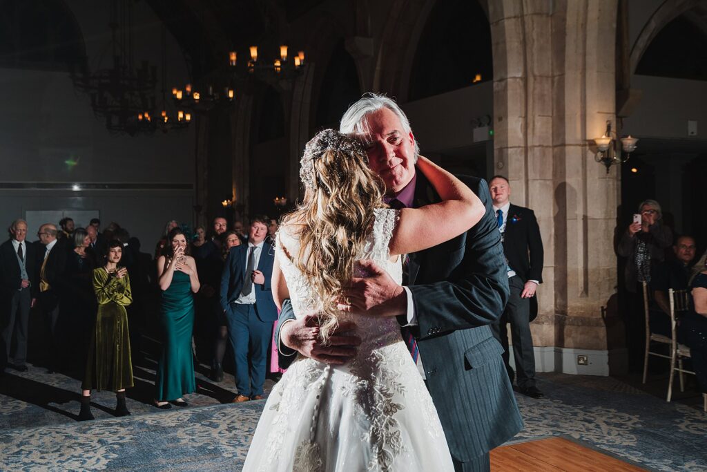 Bride and Father of the Bride having a dance together to start the evening celebrations at the Wedding at the Bolton Wedding Venue, The Cloisters