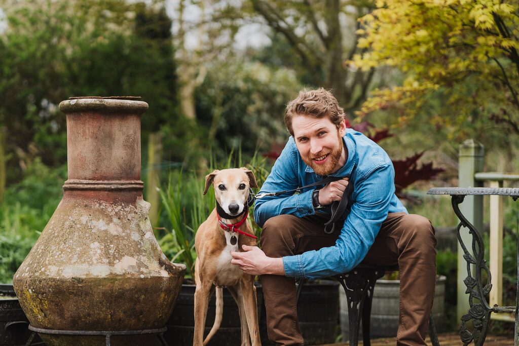 Groom with his dog in the garden Shropshire Pre Wedding Shoot