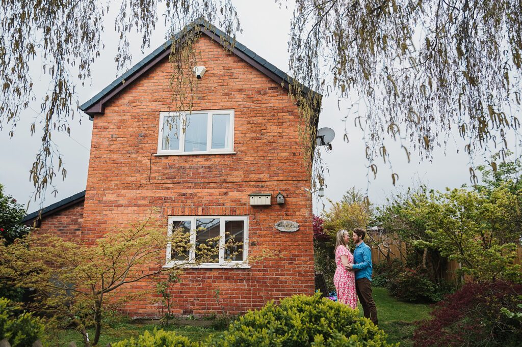 Bride and Groom to be having a chat outside Groom's parents house in Bronington Whitchurch, Shropshire