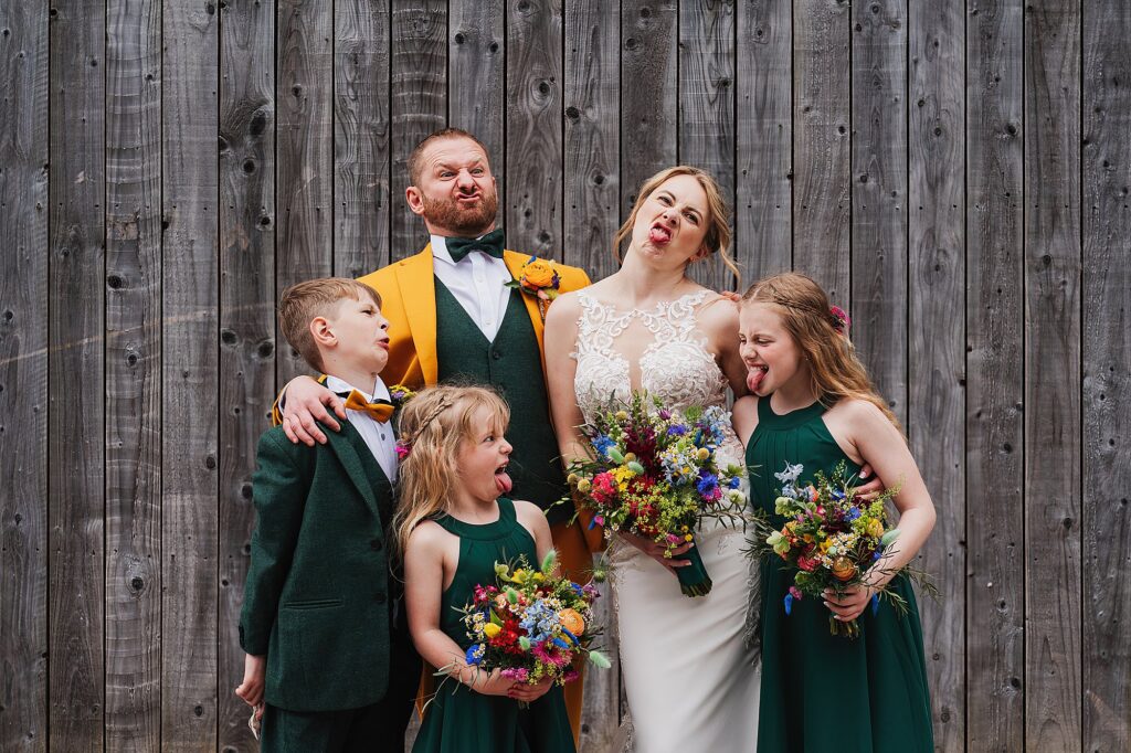 Bride and Groom pulling faces with the Page Boy and Flower Girls // Alcumlow Barn, Cheshire Photographer // Cheshire Wedding Photography