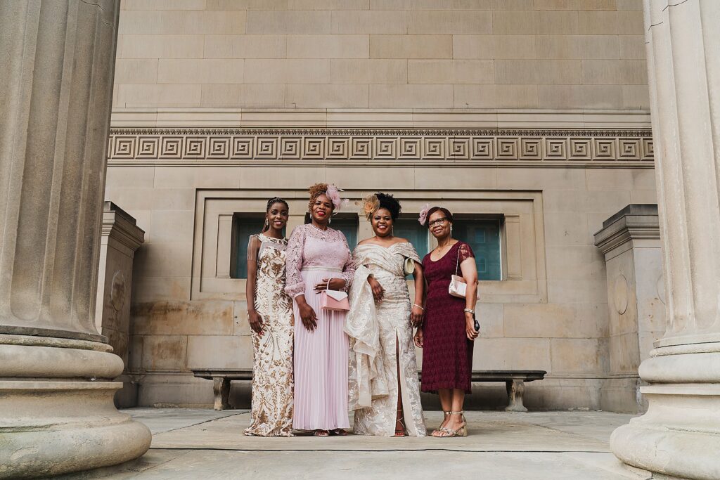 Some of the family members posing for a photo outside the incredible St George's Hall, Liverpool Wedding Photographer

