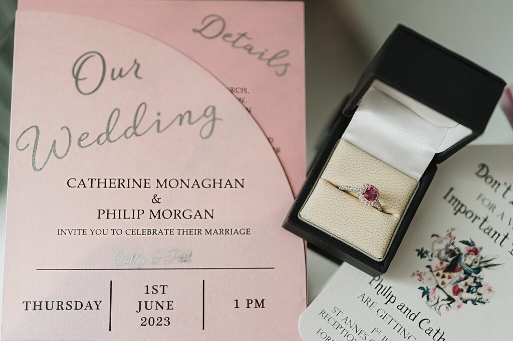 Flat lay of the bride and grooms stationery and stunning engagement ring // Charlotte Giddings Photography