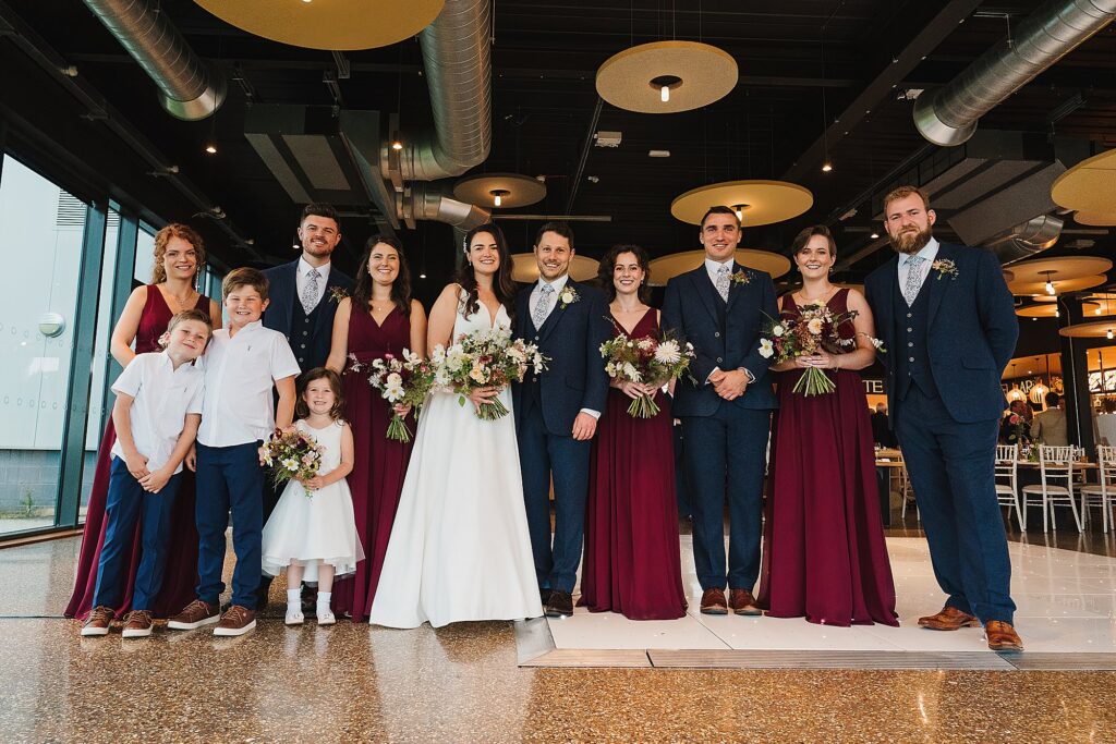 Group photo of the bride and groom, groomsmen and bridesmaids as Hencote Estate // Shropshire Wedding Photographer