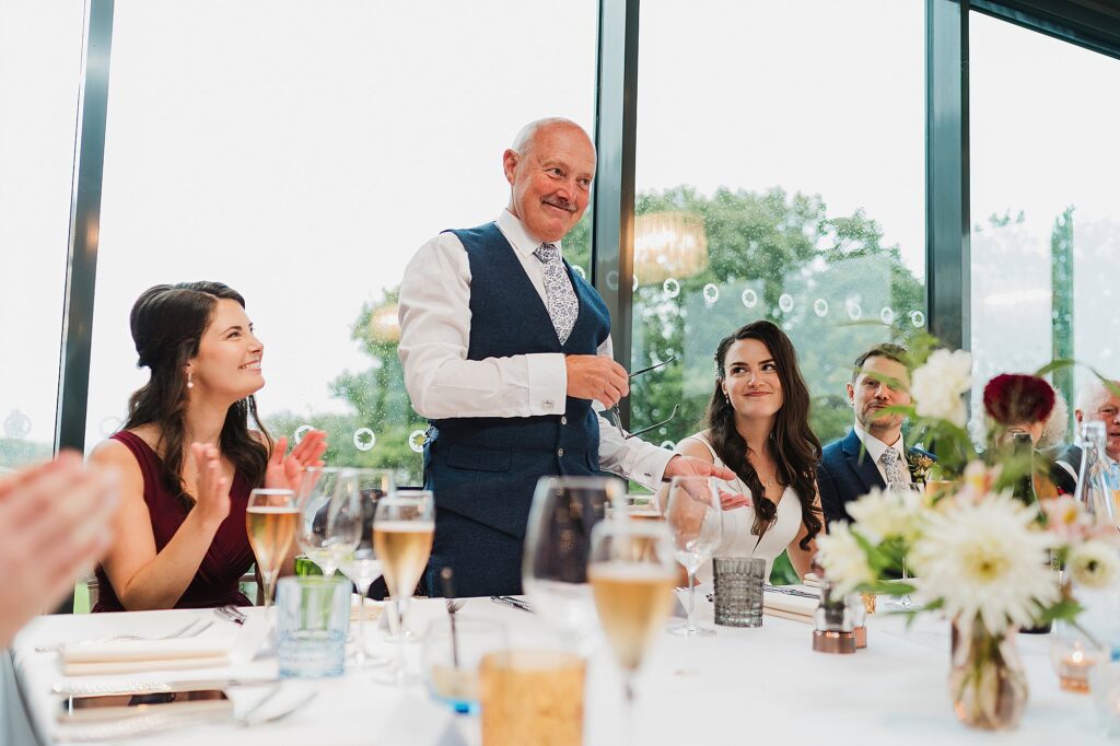 Father of the bride doing his speech at the top table at Hencote Estate // Wedding Photographer Shropshire