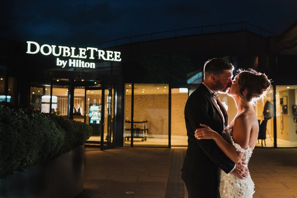 Bride and Groom night time portrait outside the Doubletree by Hilton, Chester