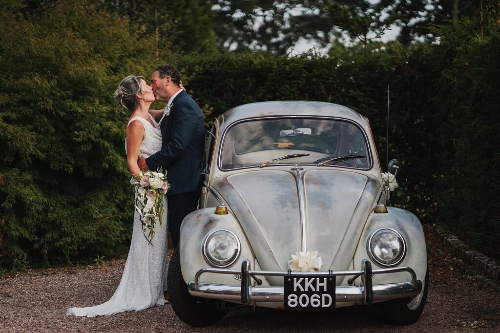 Bride and Groom portrait by beetle car // Goldstone Hall, Shropshire
