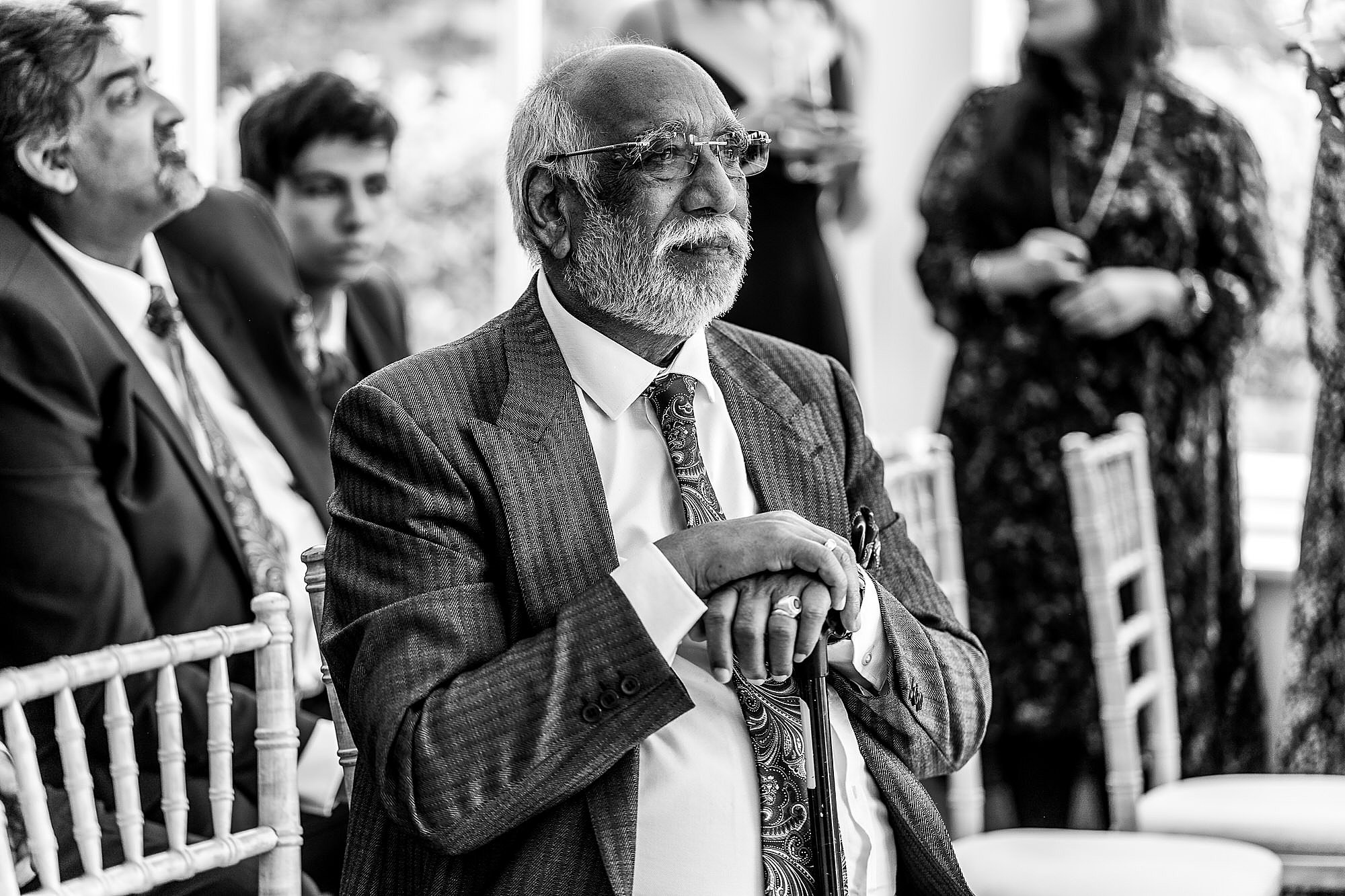 Grandad looking adoringly at it grand daughter at Combermere Abbey Wedding Ceremony<br />
